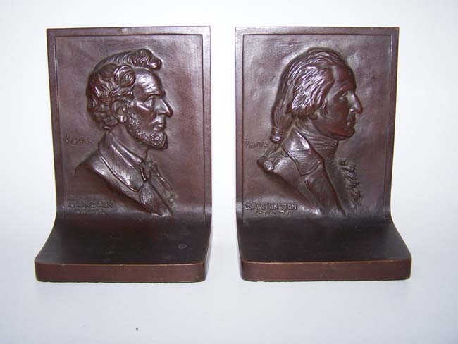 An exceptionally fine pair of solid bronze Antique Bookends circa 1915 depicting Washington and Lincoln.